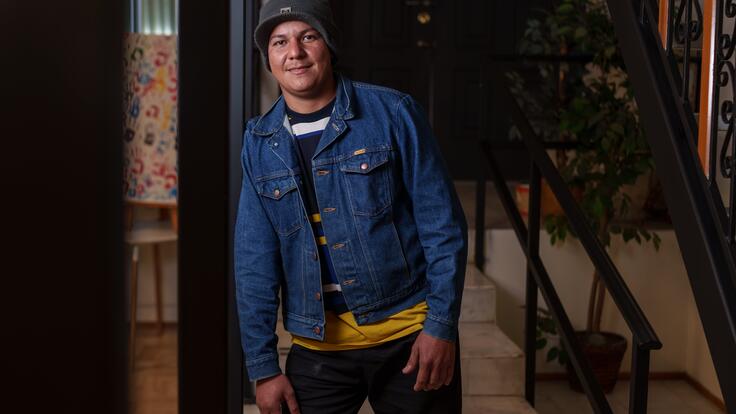 Iván, 28, from Venezuela, poses for a portrait after an activity part of a men’s group at the IRC office in Ciudad Juárez.