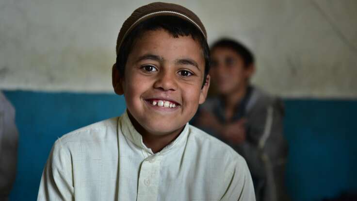 Child smiling at the camera