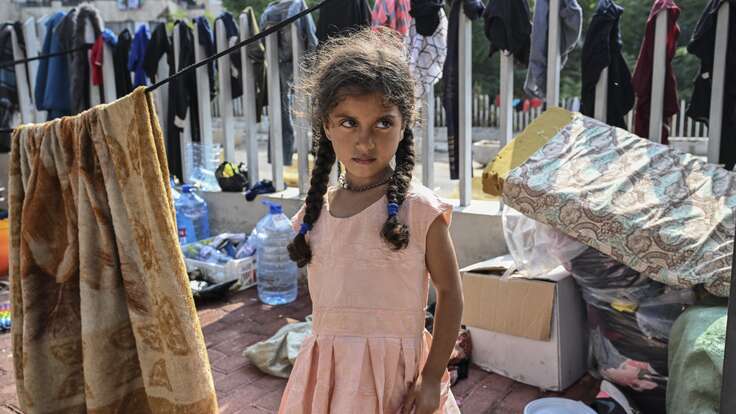 A young displaced refugee, pictured on the street of Beirut, Lebanon.