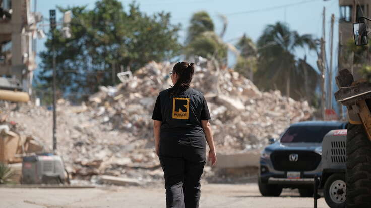  IRC staff members in La Guaira survey the destruction of the twin earthquakes on June 24.