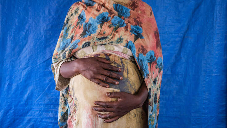 Portrait of Mariam* at Materity Ward in IRC clinic in Aboutengue refugee camp.