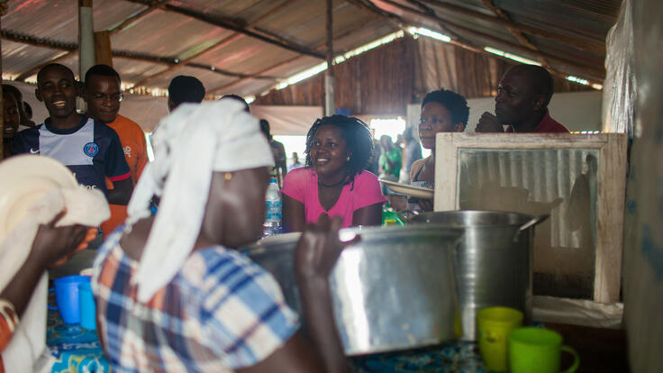 Customers line up to buy lunch.