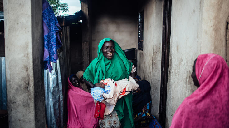 Halima Yakubu, and her brother’s baby, Bello Ibrahim, captured by KC a few hours after Bello’s naming ceremony at their home in Gwoza, Borno, Nigeria.