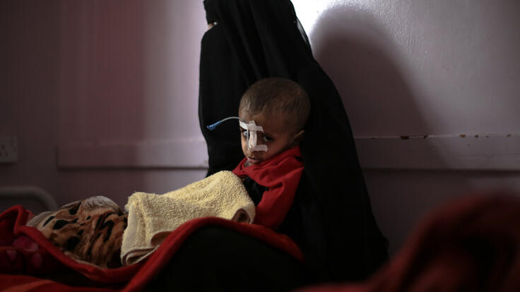 Malnourished child with his mother in Yemen