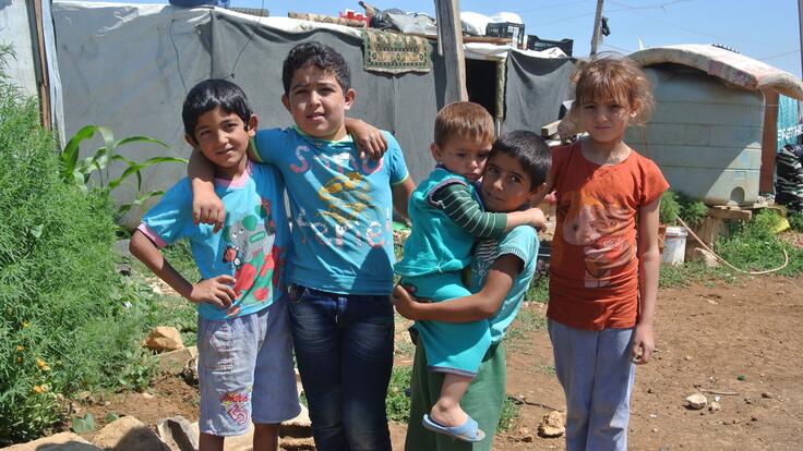 A group of children posing for a picture.