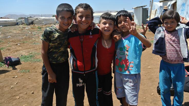 A group of boys posing together for a photo.