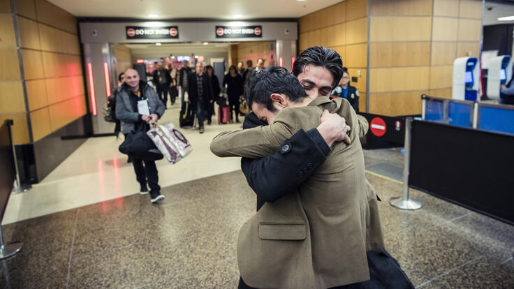 18-year-old Mohamed hugging his older brother Walid.