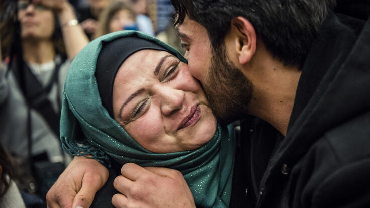 Emtisal hugging her son Walid.