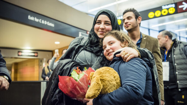 Jaidaa, Alaa and Mohamed waving goodbye.