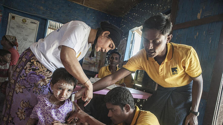 IRC mobile health teams of doctors and nurses providing basic primary health care to a family.