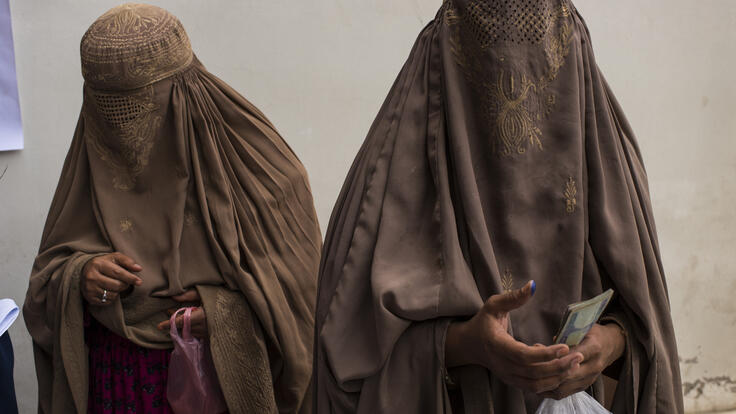 Women carrying cash.