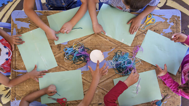 Children doing arts and crafts.