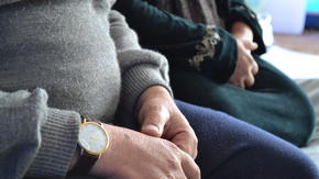 Two displaced Iraqis in a camp