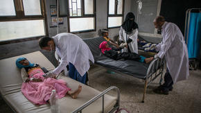 Doctors care for children who are patients at an IRC diarrhea treatment center in Yemen