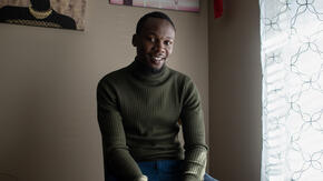 Fredrick in his home. 