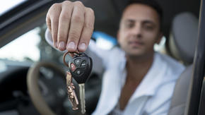 A resettled refugee with car keys