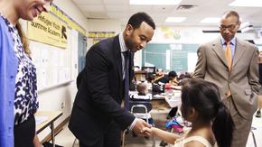 John Legend visits children at the IRC Summer Refugee Youth Academy in New York