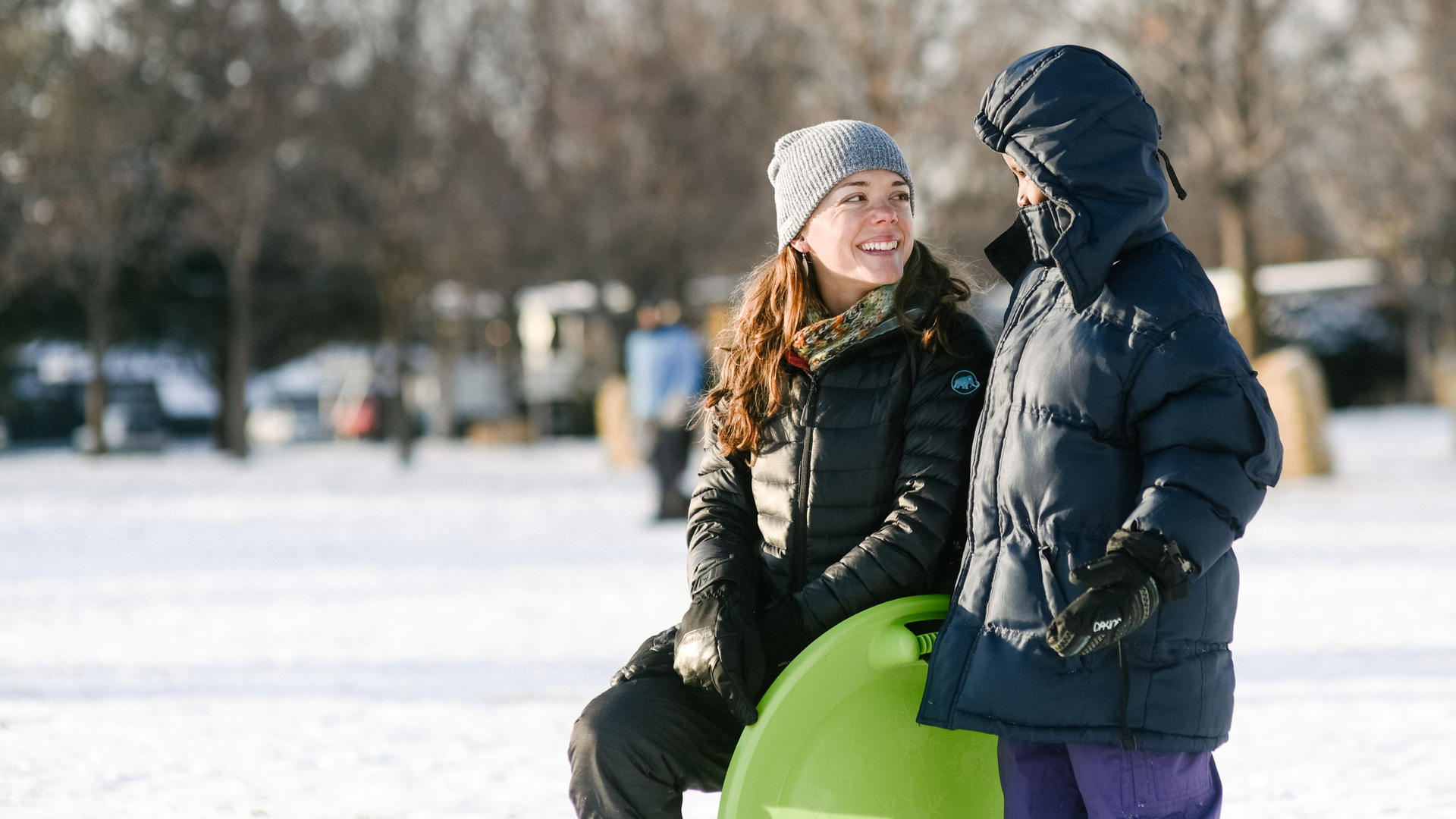 Local American with Somali boy Family mentor Jamie Utz with 8-year-old Muhammed Samatar from Somalia