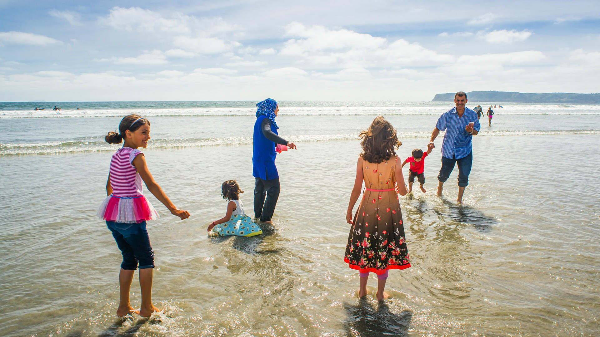 The Tlas family from Syria now live in California The Tlas family from Syria on a California beach