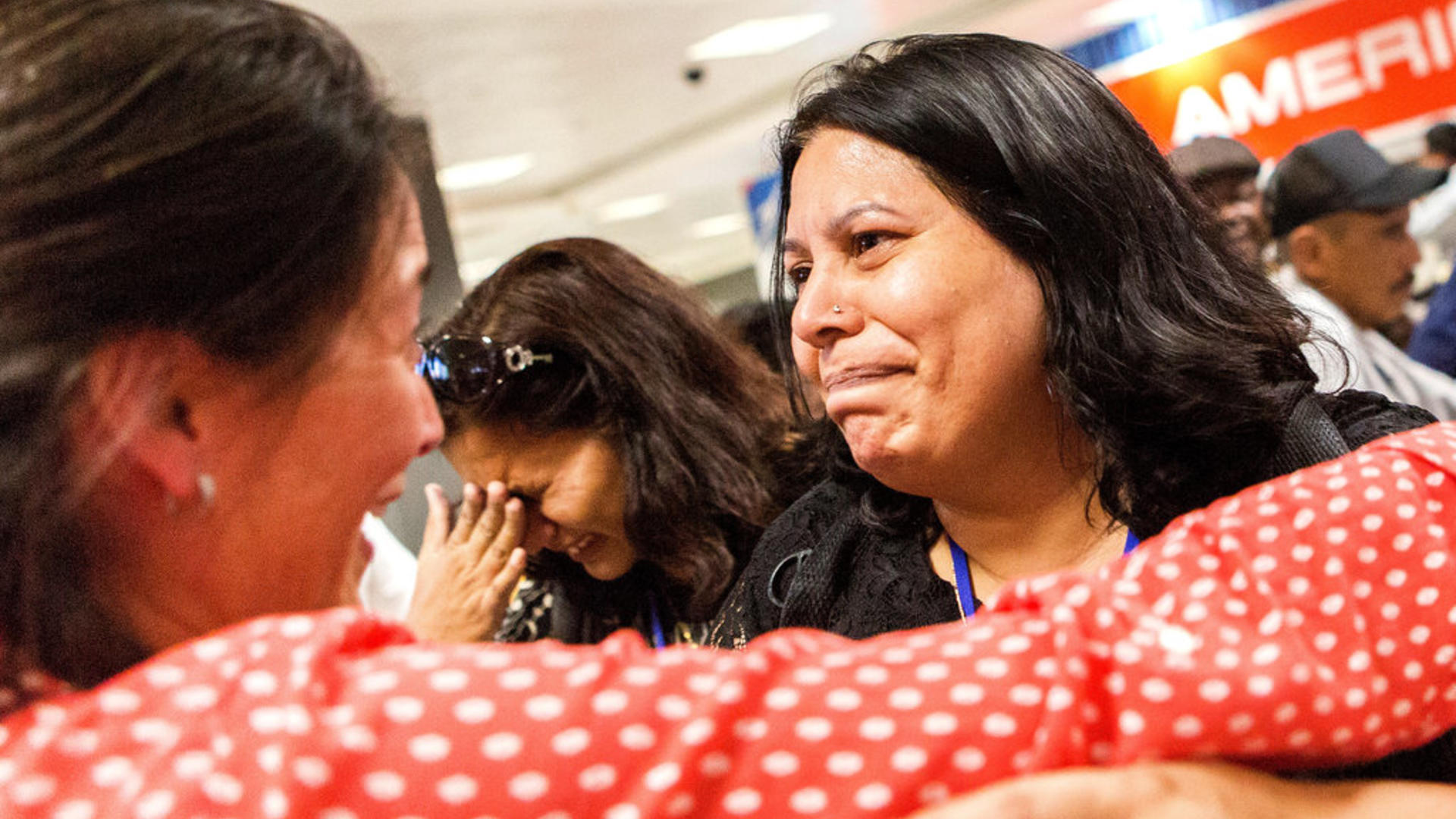 IRC staffer Kristin welcomes Shaista Sadiq at Dulles airport with a hug 