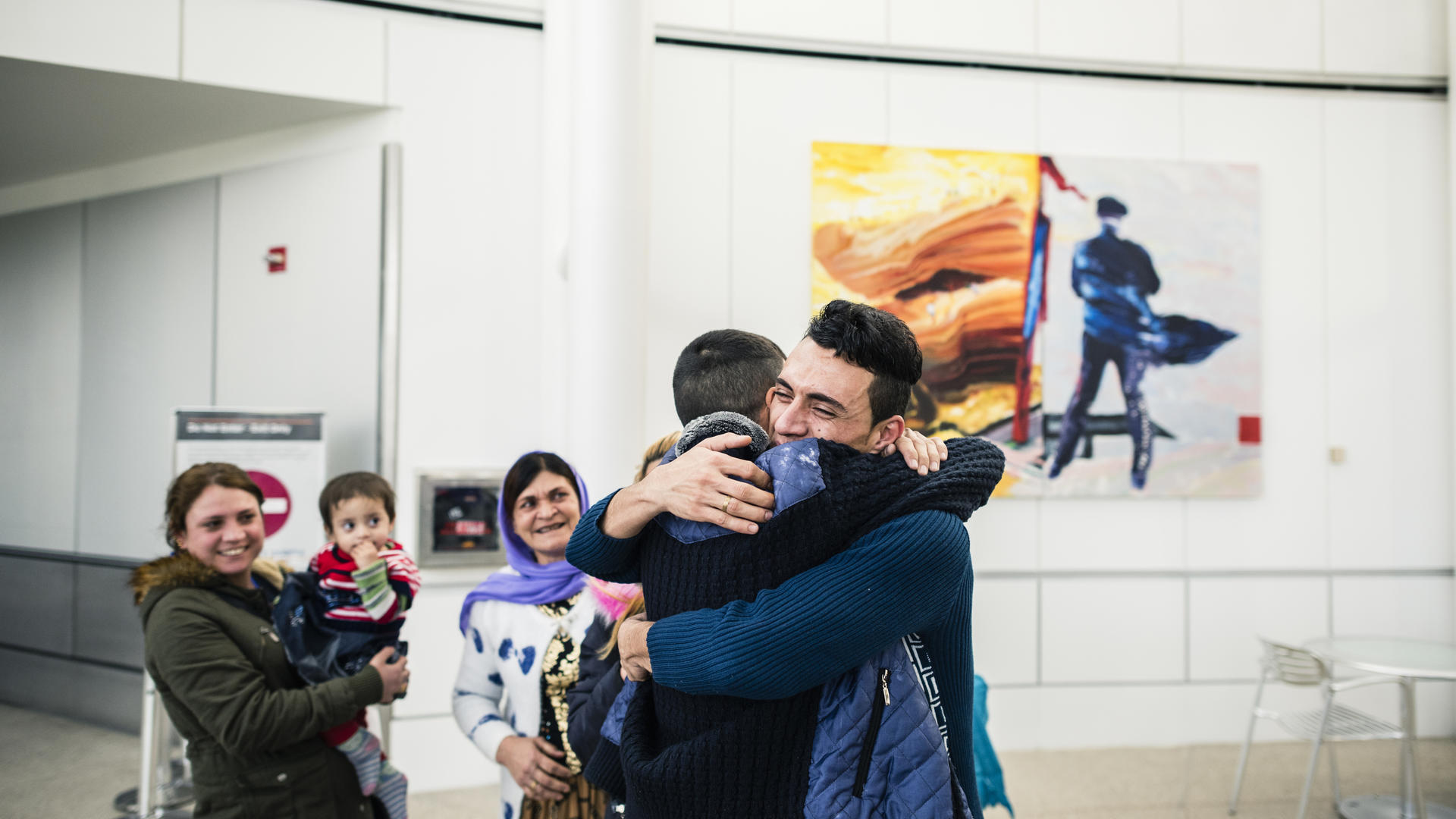 Adil Nimr, a refugee from Iraq who escaped ISIS, was reunited with 13 family members in Seattle on Feb. 10 after President Trump’s travel ban was blocked. 