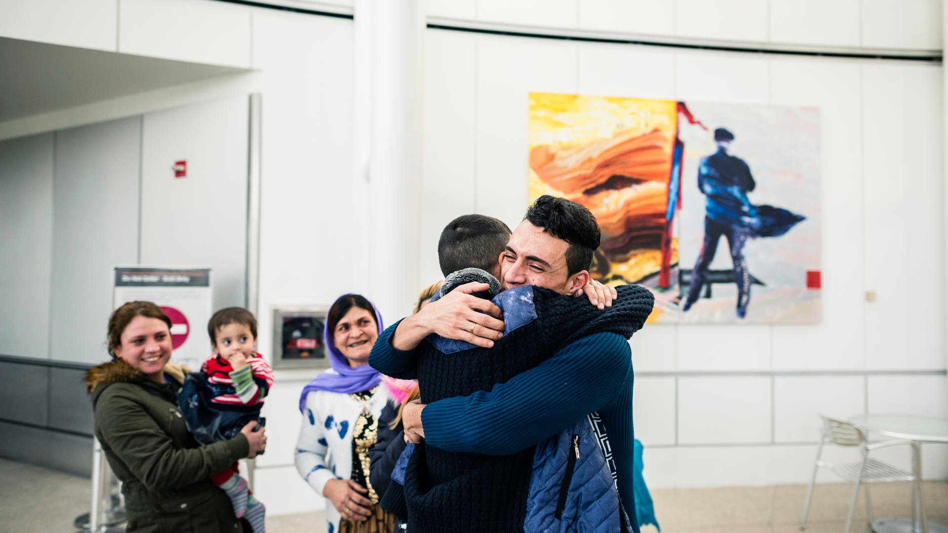Adil Nimr, a refugee from Iraq who escaped ISIS, was reunited with 13 family members in Seattle on Feb. 10 after President Trump’s travel ban was blocked. 
