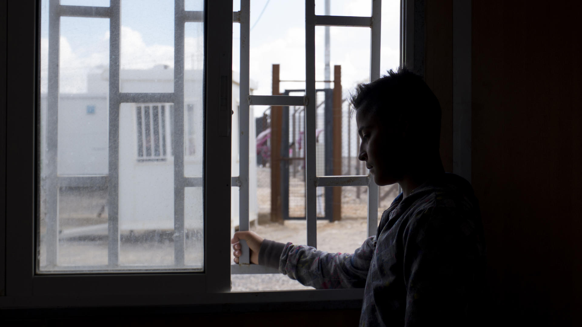 Fifteen-year-old Samir* has been waiting for four months in Jordan’s Azraq refugee camp to be reunited with his family. Fifteen-year-old Samir* has been waiting for four months in Jordan’s Azraq refugee camp to be reunited with his family.