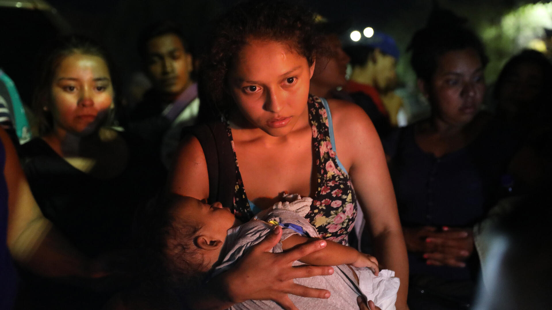 Central American asylum seekers wait for buses to take them to Tijuana on the U.S.-Mexico border. Photo: Getty Images Central American asylum seekers wait for buses to take them to Tijuana on the U.S.-Mexico border. Photo: Getty Images