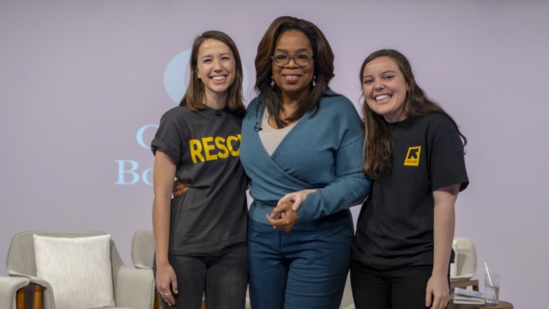 Oprah Winfrey with IRC staff Camille André and Hope Arcuri at the IRC welcome center in Phoenix, Ariz. for asylum seekers Oprah Winfrey with IRC staff Camille André and Hope Arcuri in Phoenix. Ariz.