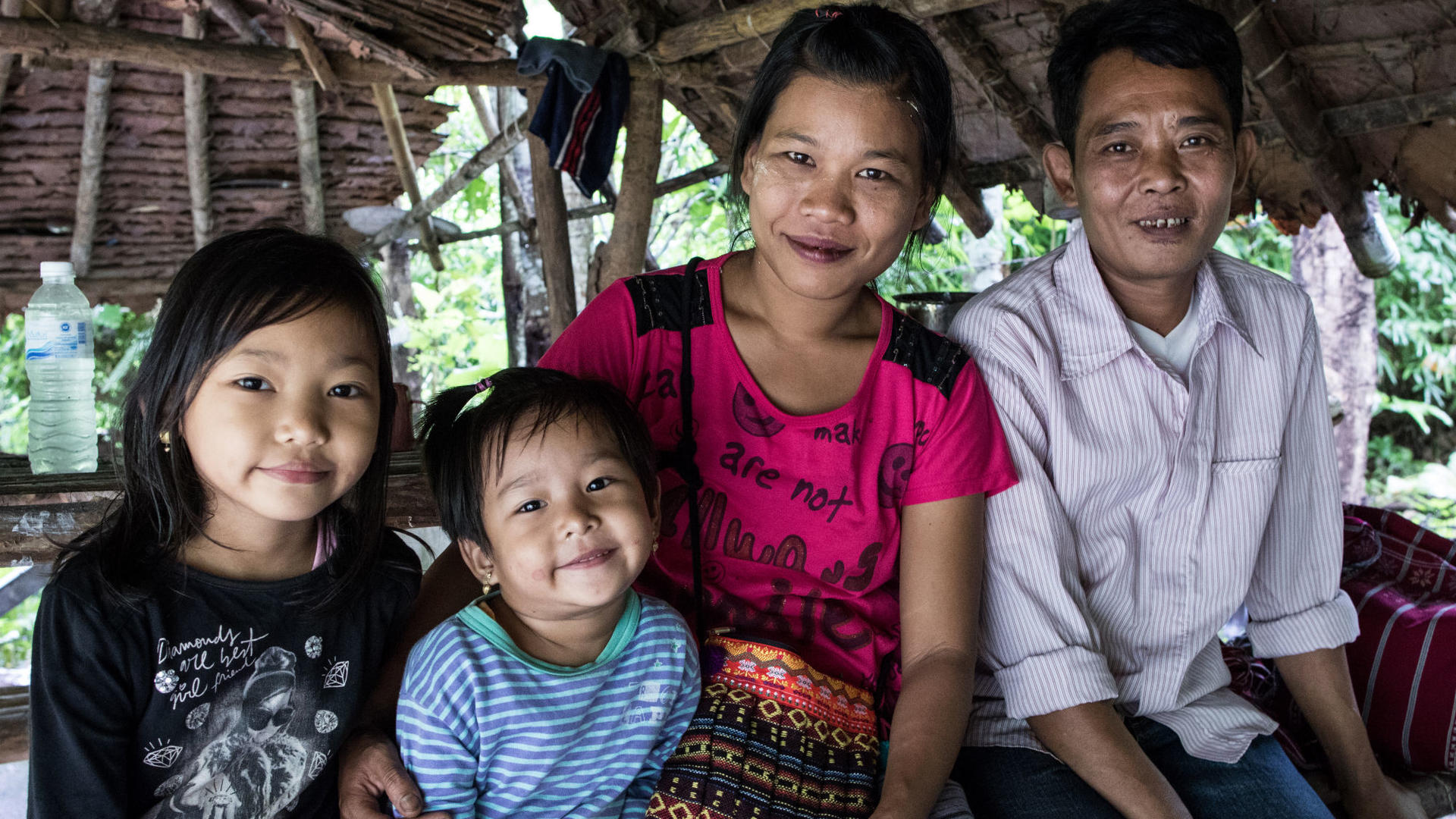 Bar Mee, Tin Win and their two young daughters at Mae La refugee camp in Thailand.