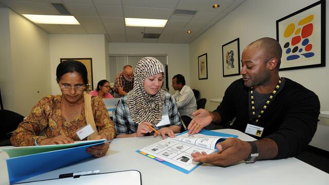 Refugees learning English as part of employment readiness training in the United States